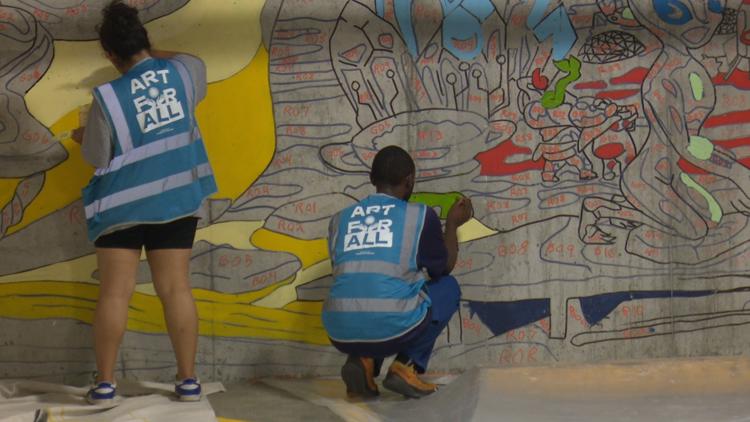 Austin’s downtown library garage gets colorful makeover while creating opportunities for homeless