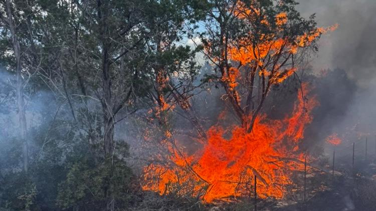 Grass fire in southern Burnet County started by debris burning during burn ban