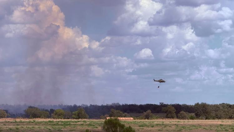 Fire burns 125 acres near Mustang Ridge